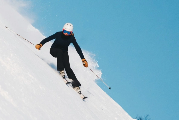 skiing moguls on steeps
