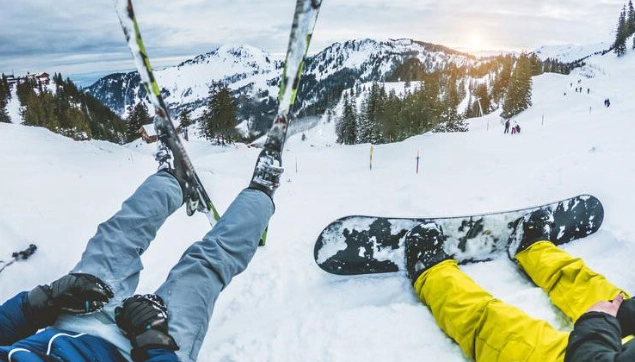 difference between ski and snowboard boots