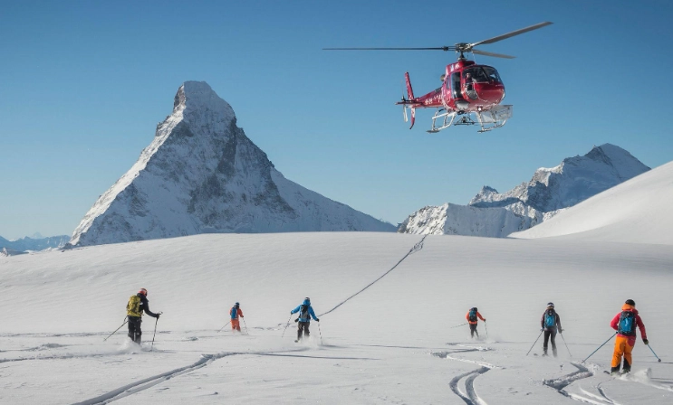 heli skiing vs cat skiing
